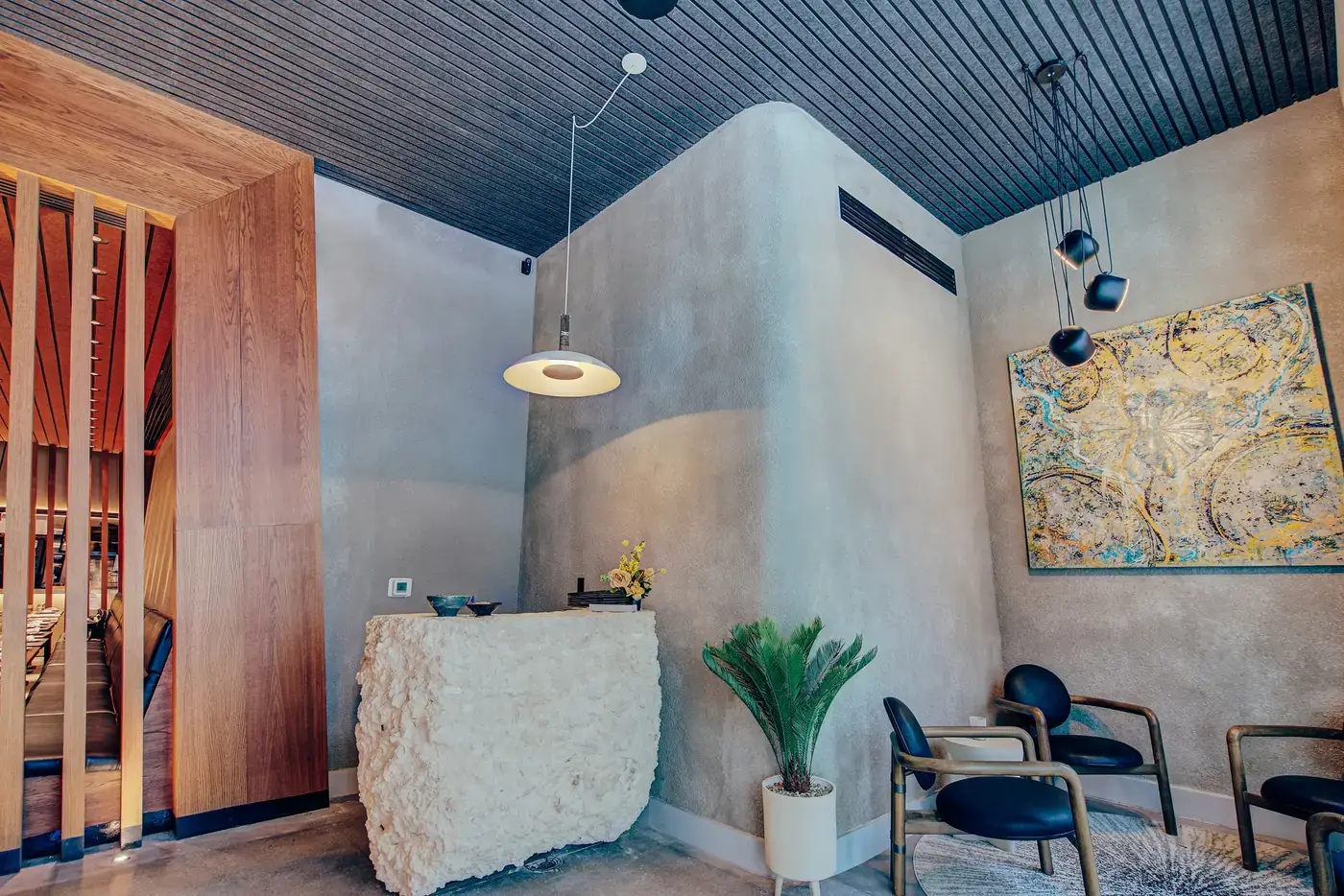 Hand-hewn oolite limestone host stand