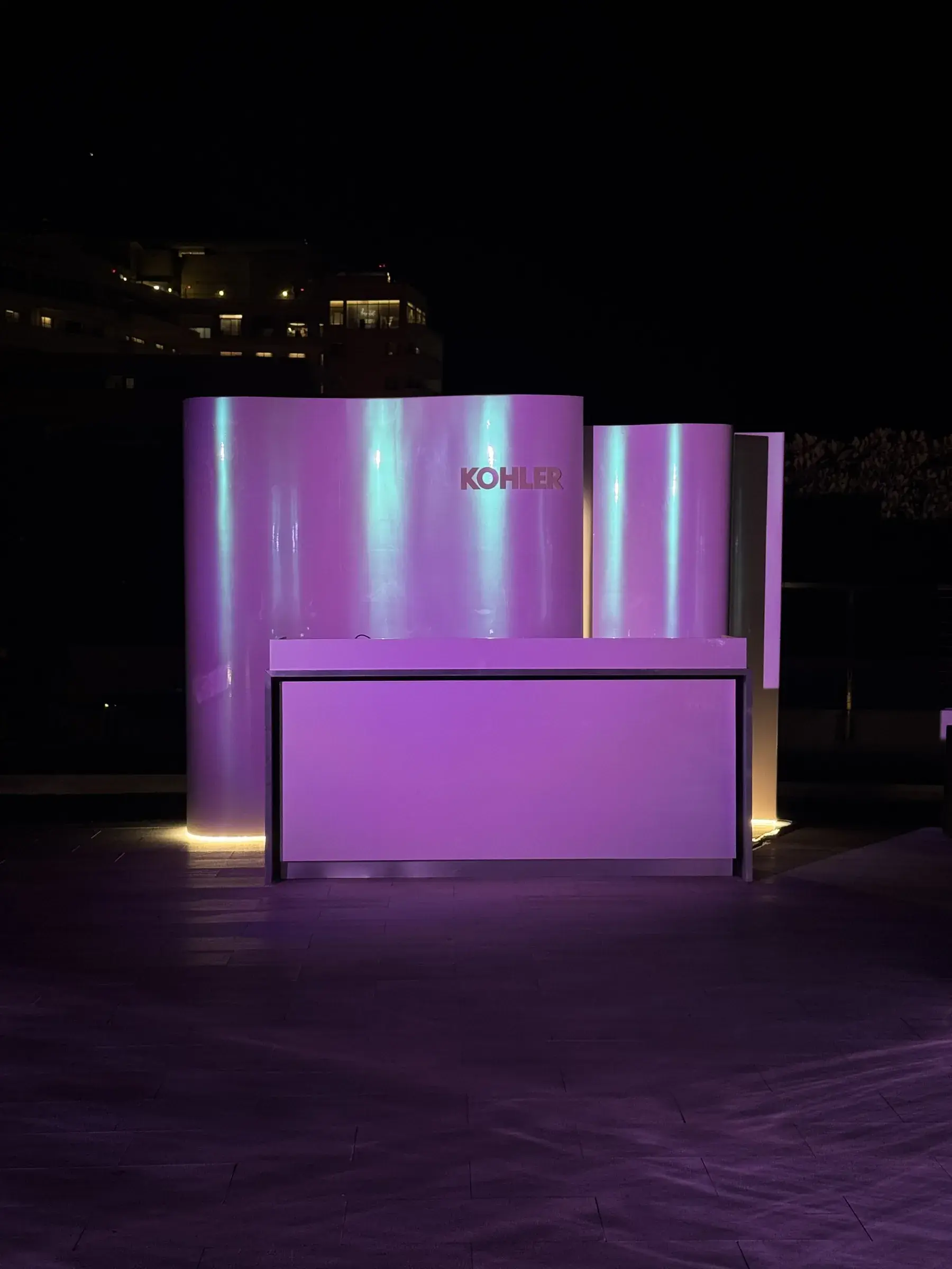 The after-party bar at night with warm underglow at the base