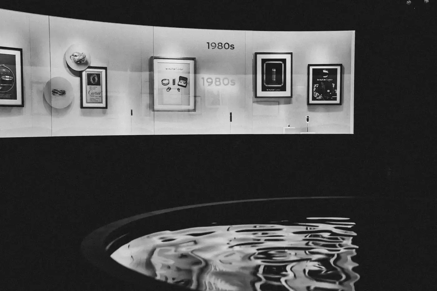Archive wall above a reflecting pool