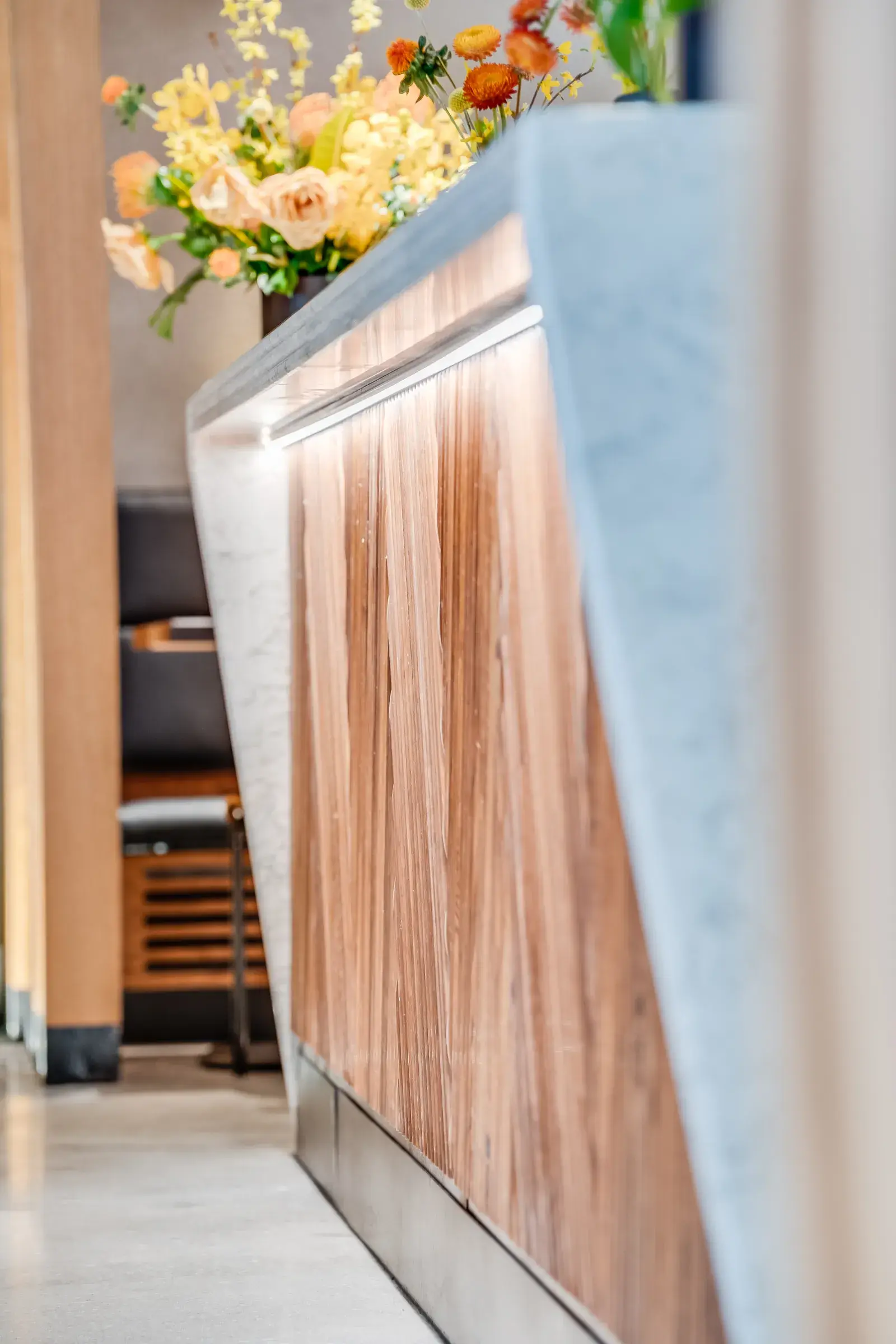 Marble waterfall end meeting the tambour face