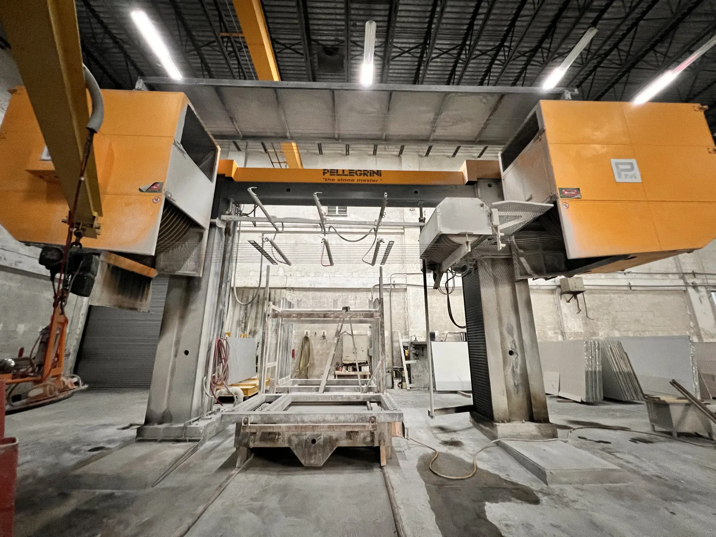 Pellegrini gantry saw installed on its new concrete foundation under the roof trusses